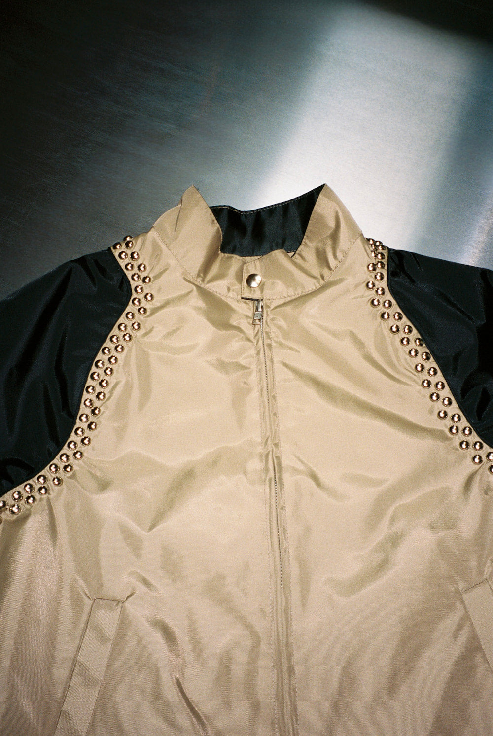 the JACKET in Black and Beige, Beaded